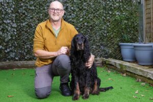 Portrait of Locksheath Gordon Setters owner with Gordon Setter dog